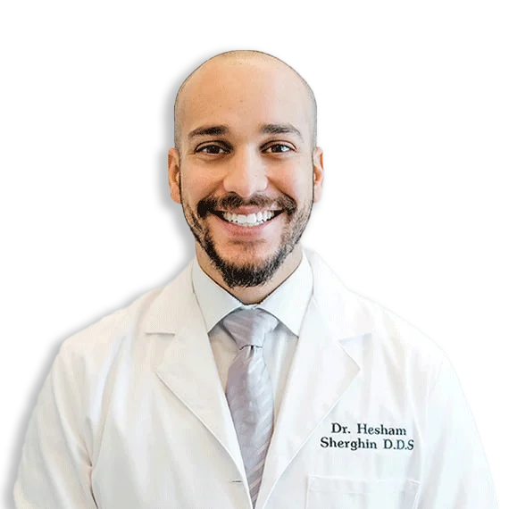 A photo of a smiling dentist.